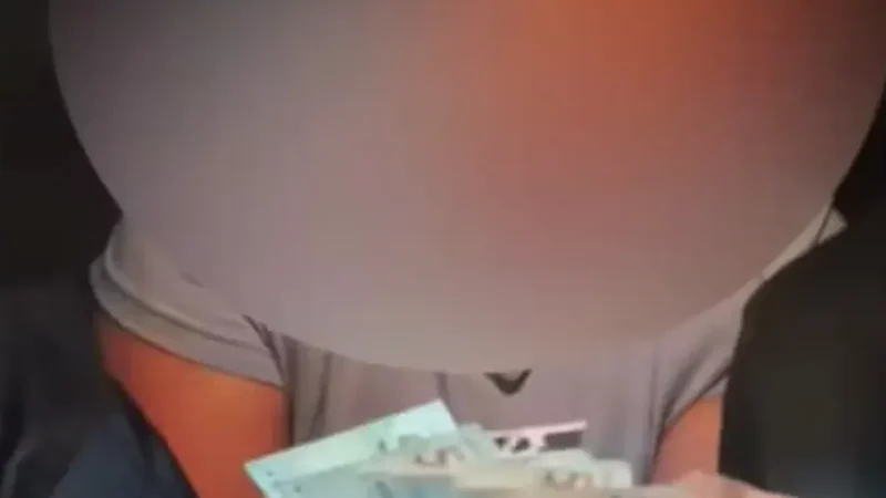Tensão em ji-paraná: mulher tenta subornar policiais com r$ 300 do bolsa família após companheiro agredir agentes em flagrante e é autuada por corrupção ativa